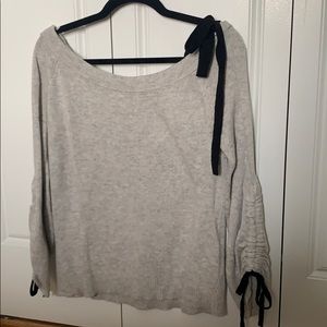 Grey off the shoulder sweater W/ black bows